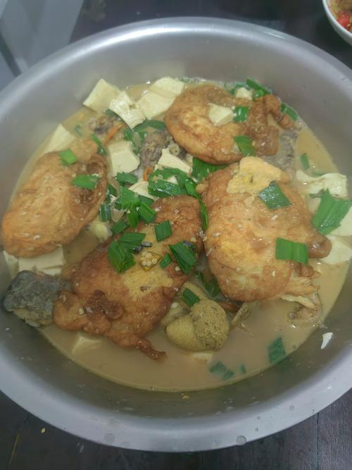 鲤鱼炖豆腐的做法